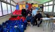 Impulsa apoyo educativo y comunitario con entrega de 600 kits escolares