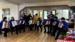 Jóvenes acordeonistas de Queilen llevaron música y alegría a personas mayores del Hogar San Vicente de Paul de Ancud