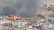 Reportan incendio en vivienda en toma en la comuna de Alto Hospicio