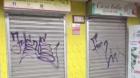 Comerciantes de Castro denuncian grafitis utilizados para marcar locales