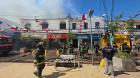 [FOTOS] Incendio afectó a cinco locales en el centro de Quillota: 8 damnificados y 1 bombero lesionado