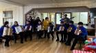 Jóvenes acordeonistas de Queilen llevaron música y alegría a personas mayores del Hogar San Vicente de Paul de Ancud